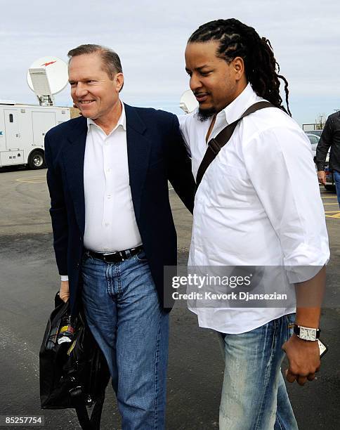 Manny Ramirez of the Los Angeles Dodgers arrives from Los Angeles with agent Scott Boras on March 5 at Camelback Ranch in Glendale, Arizona. Ramirez...