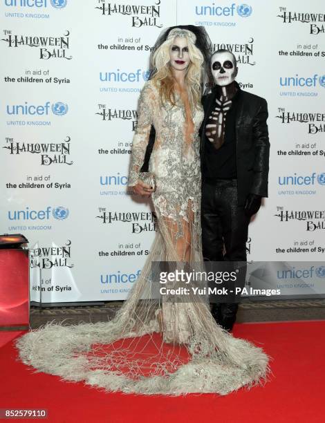 Julien Macdonald and Melissa Odabash attending the UNICEF UK Halloween Ball - to raise funds to help Syrian children - at One Mayfair in central...