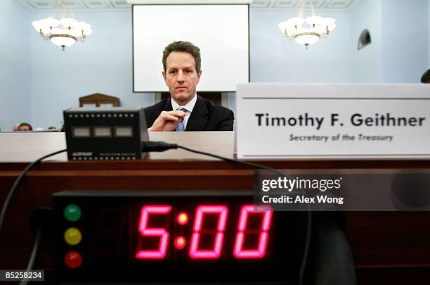 Tim Geithner U.S. Secretary of the Treasury Timothy Geithner adjusts his... News ...