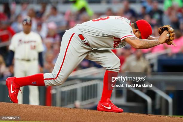 Henderson Alvarez of the Philadelphia Phillies winds up in the first inning of an MLB game against the Atlanta Braves at SunTrust Park on September...