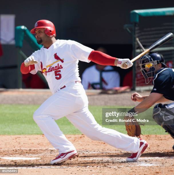 Albert Pujols of the St. Louis Cardinals bats during a spring training game against the Tampa Bay Rays at Roger Dean Stadium on March 1, 2009 in...