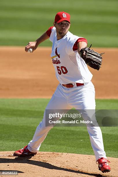 Adam Wainwright of the St. Louis Cardinals pitches during a spring training game against the Tampa Bay Rays at Roger Dean Stadium on March 1, 2009 in...