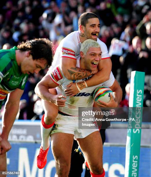 England's Ryan Hall celebrates with Rangi Chase after scoring his hat-trick during the 2013 World Cup match at the John Smith's Stadium, Huddersfield.