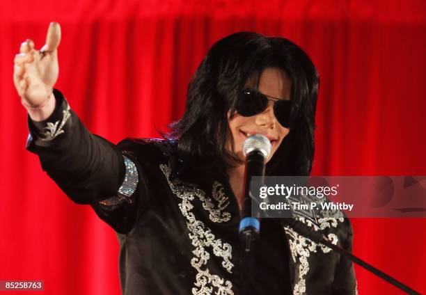 Michael Jackson gestures as he announces plans for Summer residency at the O2 Arena at a press conference held at the O2 Arena on March 5, 2009 in...