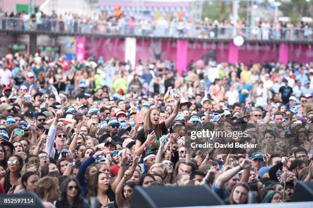 Fans attend the Daytime Village Presented by Capital One at the 2017 HeartRadio Music Festival at the Las Vegas Village on September 23, 2017 in Las...