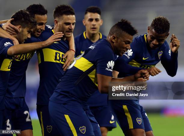 Frank Fabra of Boca Juniors celebrates with teammates after scoring his team's fourth goal during a match between Velez Sarsfield and Boca Juniors as...