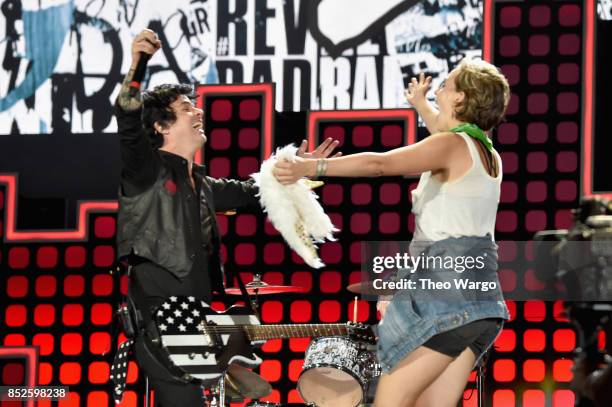 Musician Billie Joe Armstrong of Green Day and a music fan perform onstage during the 2017 Global Citizen Festival: For Freedom. For Justice. For...