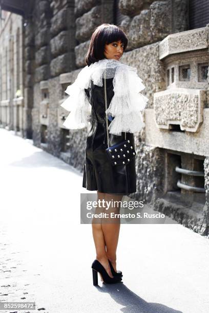 Artist and actress Kat Graham wears Philosophy Di Lorenzo Serafini, Alaia shoes, Sandro purse during Milan Fashion Week Spring/Summer 2018 on...