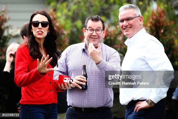 Labour Leader Jacinda Ardern talks with Labour Party MP Grant Robertson and deputy leader Kelvin Davis at her house on September 24, 2017 in...