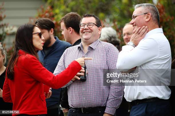 Labour Leader Jacinda Ardern talks with Labour Party MP Grant Robertson and deputy leader Kelvin Davis at her house on September 24, 2017 in...