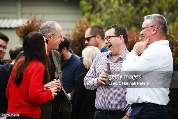Labour Leader Jacinda Ardern talks with Labour Party MP Phil Twyford, Grant Robertson and deputy leader Kelvin Davis at her house on September 24,...