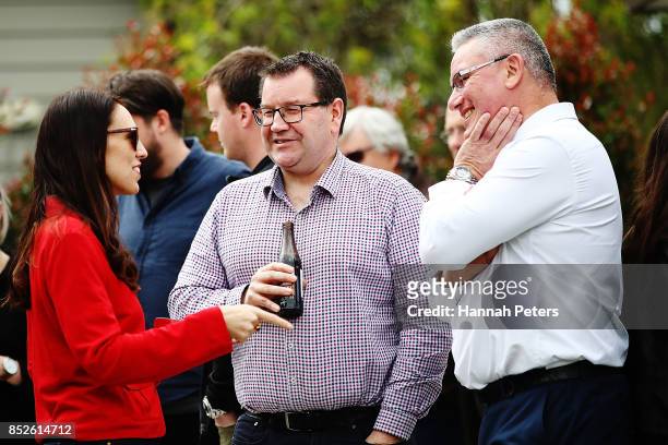 Labour Leader Jacinda Ardern talks with Labour Party MP Grant Robertson and deputy leader Kelvin Davis at her house on September 24, 2017 in...