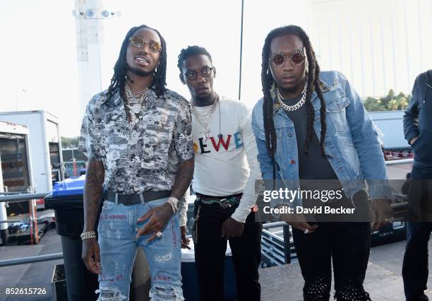 Quavo, Offset and Takeoff of Migos backstage during the Daytime Village Presented by Capital One at the 2017 HeartRadio Music Festival at the Las...