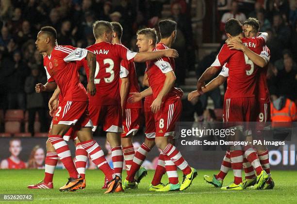 Southampton's Steven Davis celebrates with his team-mates after scoring his side's fourth goal of the game