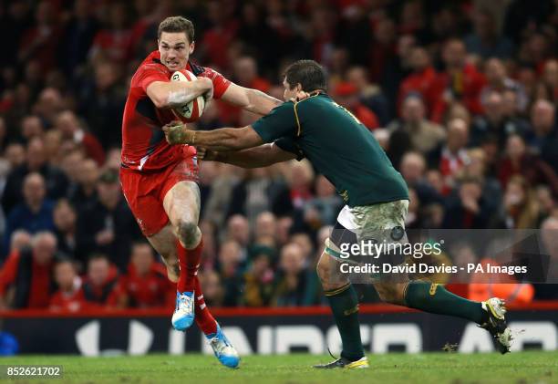 Wales George North gets away from South Africa's Willem Alberts during the Dove Men Series match at the Millennium Stadium, Cardiff.