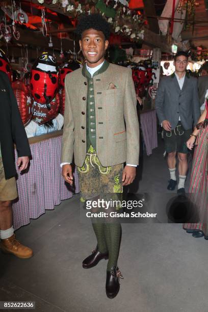 David Alaba wearing a traditional clothes by "Amsel Fashion" during the "FC Bayern Wies'n" as part of the Oktoberfest at Theresienwiese on September...