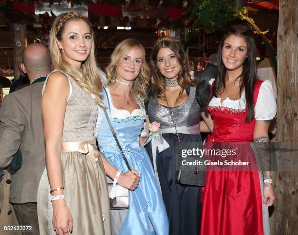 Lisa Ulreich, wife of Sven Ulreich, Elena Rudy, wife of FC Bayern soccer player Sebastian Rudy, Cathy Hummels wearing a dirndl by Angermaier Trachten...