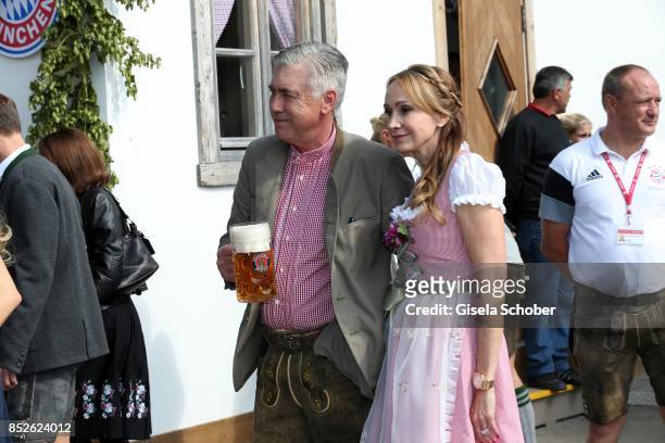 Coach Carlo Ancelotti and his wife Mariann Barrena McClay during the "FC Bayern Wies'n" as part of the Oktoberfest at Theresienwiese on September 23,...