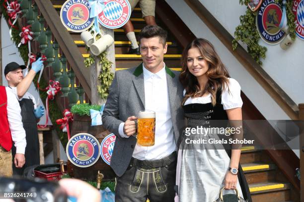 Robert Lewandowski and his wife Anna Lewandowski during the "FC Bayern Wies'n" as part of the Oktoberfest at Theresienwiese on September 23, 2017 in...