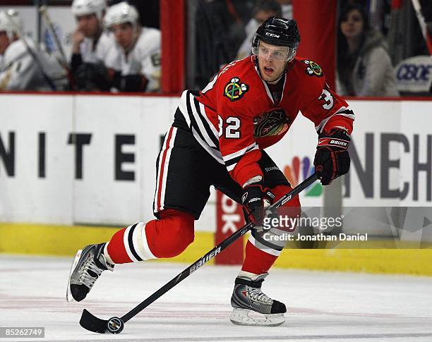 Kris Versteeg of the Chicago Blackhawks skates with the puck against the Anaheim Ducks on March 3, 2009 at the United Center in Chicago, Illinois....