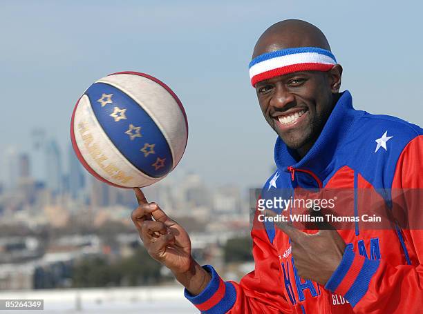 Harlem Globetrotters' Special K Daley spins a basketball on his index finger during a game March 5, 2009 on the rooftop of the Wachovia Spectrum. The...