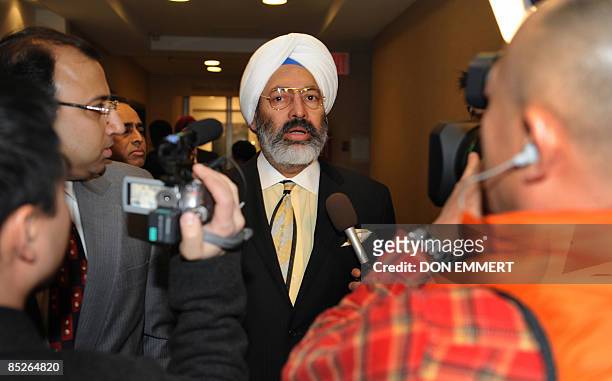 Tony Bedi, a representative for winning bidder Vijay Mallya, who owns Kingfisher beer, talks to reporters prior to a controversial auction of Indian...