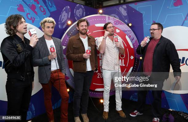Matthew Followill, Jared Followill, Caleb Followill, and Nathan Followill of music group Kings Of Leon and Woody attend the 2017 iHeartRadio Music...