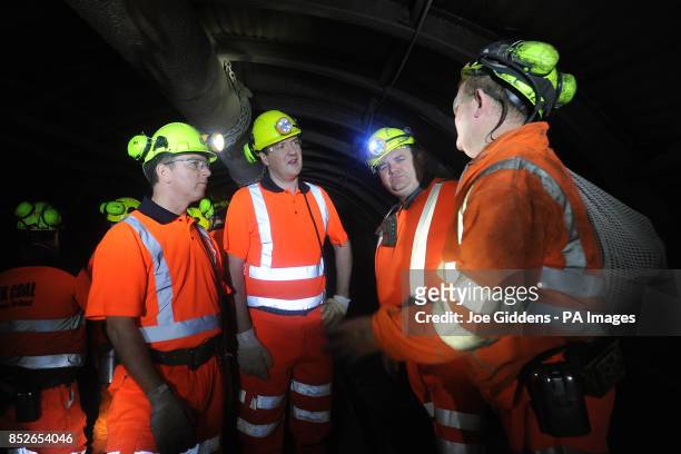 Chancellor George Osborne is given a tour of the mineshaft by chief executive of UK Coal Kevin McCullough , production under-manager Ian Hunter and...