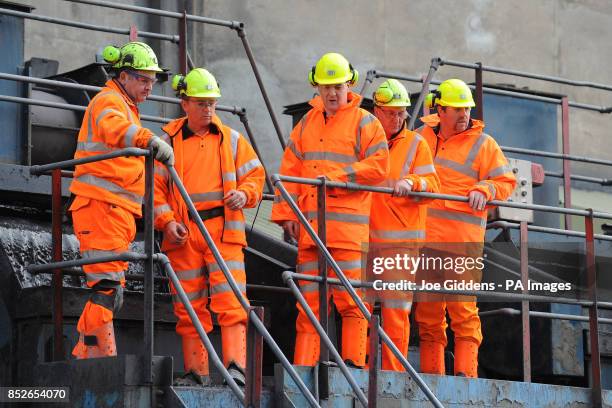Chancellor George Osborne is given a tour by mine manager Derek Main , chief executive of UK Coal Kevin McCullough , surface manager Dave Lewis and...