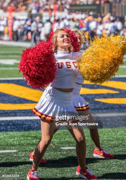 Trojans cheerleaders with something to cheer about keep the fans active during the regular season game between the USC Trojans verses the California...