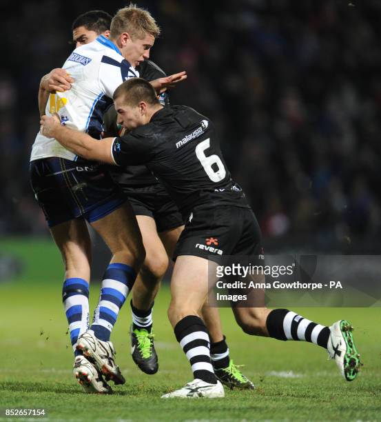 Scotland's Brett Phillips is tackled by New Zealand's Kieran Foran and Jesse Bromwich during the World Cup Quarter Final match at Headingley Stadium,...