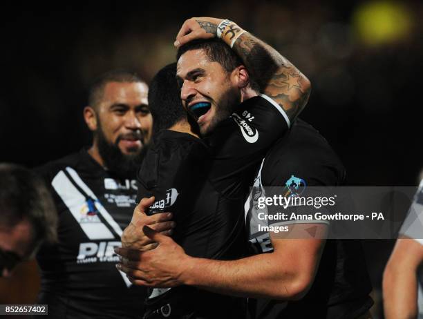 New Zealand's Jesse Bromwich celebrates after scoring a try during the World Cup Quarter Final match at Headingley Stadium, Leeds.