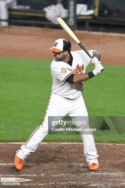 Pedro Alvarez of the Baltimore Orioles prepares for a pitch during a baseball game against the Boston Red Sox at Oriole Park at Camden Yards on...