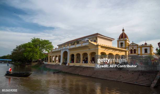 Man arrives in a boat to Santa Cruz de Mompox, Department of Bolivar, on September 23 2017, the Colombian town on the banks of the great river...