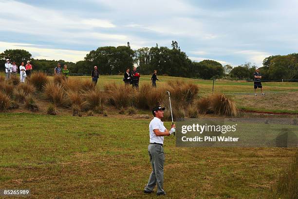 Gareth Paddison of New Zealand chips out of the rough onto the 5th green during day two of the New Zealand PGA Championship held at the Clearwater...