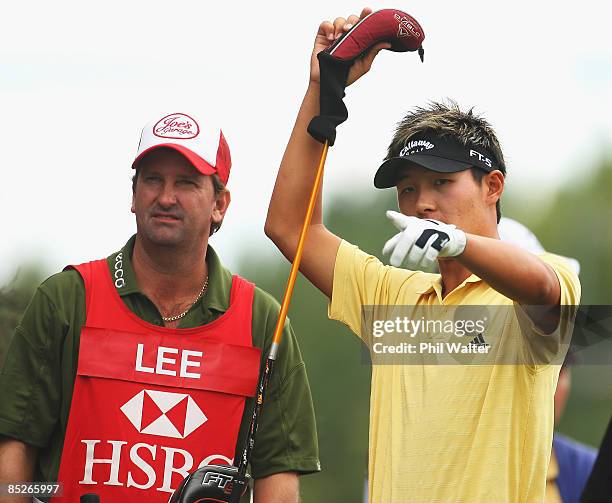 Danny Lee of New Zealand with his caddy Anthony Knight before teeing off on the 1st hole during day two of the New Zealand PGA Championship held at...