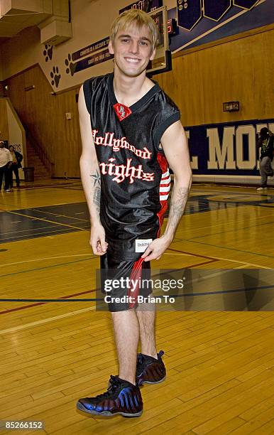 Pop singer Aaron Carter poses at The Hollywood Knights celebrity basketball game at El Monte High School on March 4, 2009 in El Monte, California.