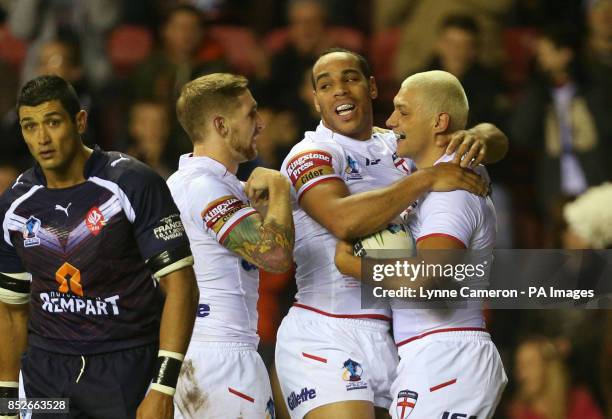 England's Ryan Hall celebrates scoring a try during the World Cup Quarter Final at the DW Stadium, Wigan.