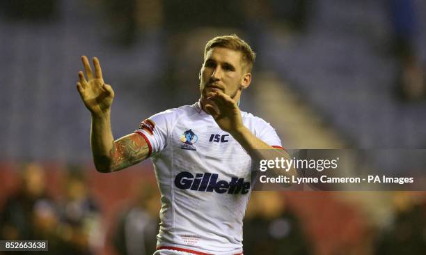 England's Sam Tomkins waves to fans after the World Cup Quarter Final at the DW Stadium, Wigan.