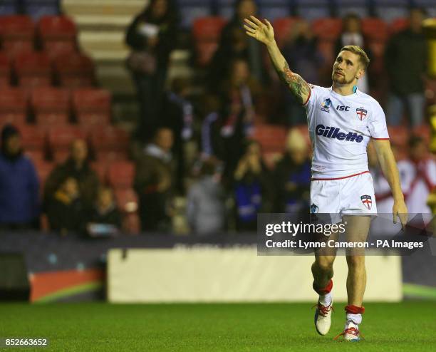 England's Sam Tomkins waves to the fans after the World Cup Quarter Final at the DW Stadium, Wigan.