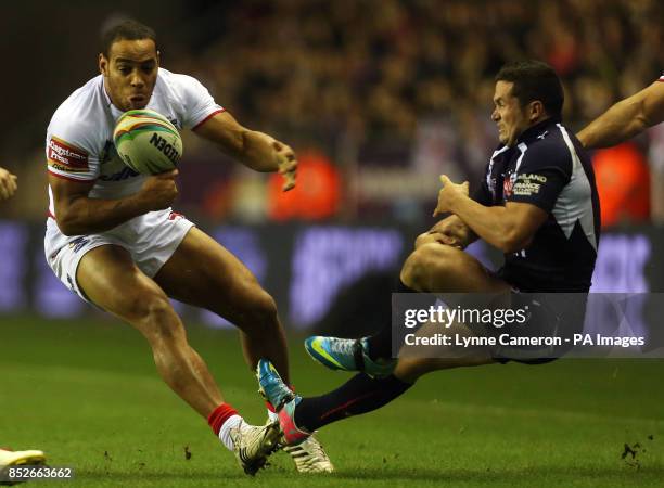 England's Leroy Cudjoe and France's Clint Greenshiields during the World Cup Quarter Final at the DW Stadium, Wigan.