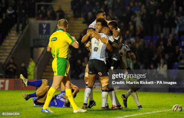 Fiji's Vitale Junior Roqica celebrates his try against Samoa, during the World Cup Quarter Final at the Halliwell Jones Stadium, Warrington.