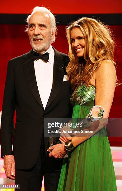 Actor Christopher Lee and model Elle Macpherson pose during the Women's World Awards show on February 5, 2009 in Vienna, Austria.