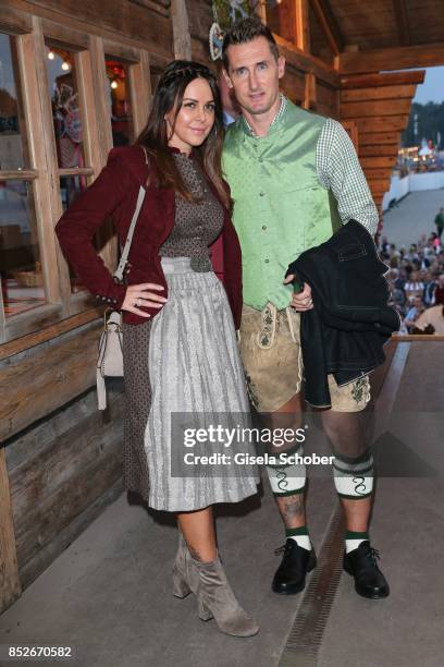 Miroslav Klose and his wife Sylwia Klose during the Oktoberfest at Theresienwiese on September 23, 2017 in Munich, Germany.