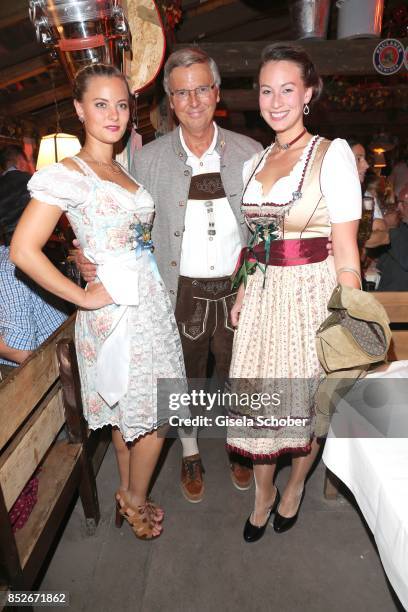 Wolfgang Bosbach with his daughters Caroline and Viktoria during the Oktoberfest at Theresienwiese on September 23, 2017 in Munich, Germany.