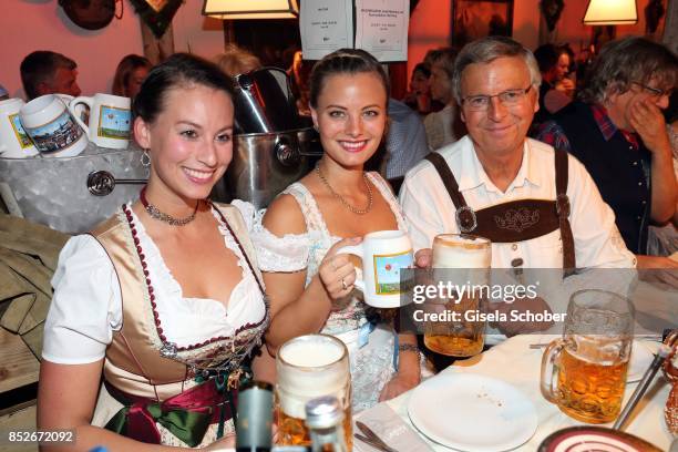 Wolfgang Bosbach with his daughters Caroline and Viktoria during the Oktoberfest at Theresienwiese on September 23, 2017 in Munich, Germany.