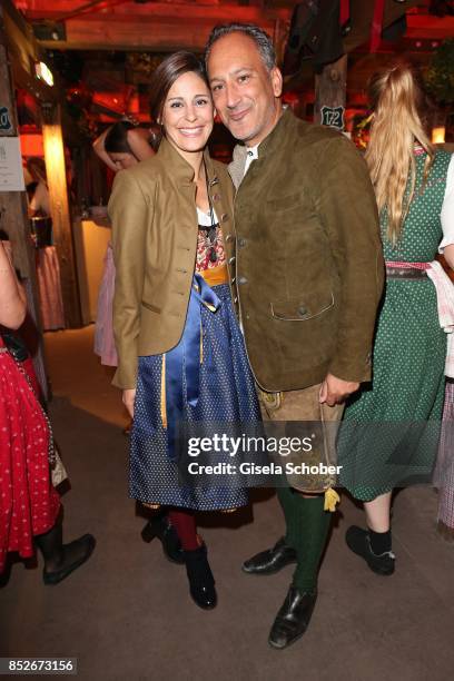 Funda Vanroy and her husband Sanjiv Singh during the Oktoberfest at Theresienwiese on September 23, 2017 in Munich, Germany.