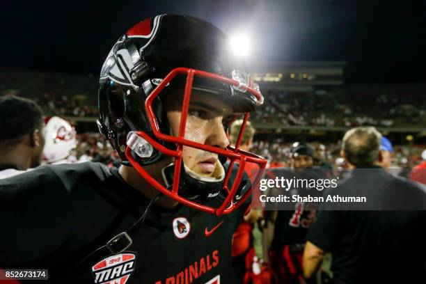 Quarterback Jack Milas of the Ball State Cardinals walks away after losing against Western Kentucky University on September 23, 2017 in Bowling...