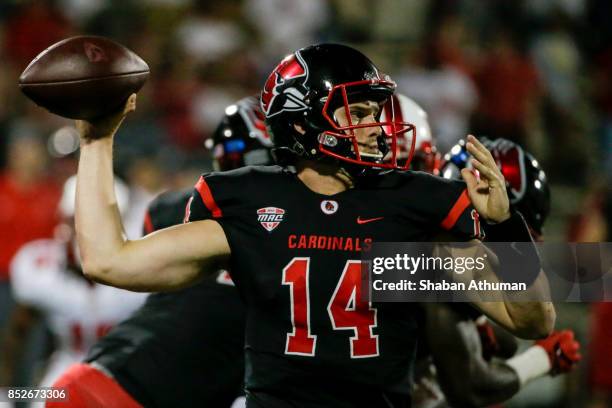 Quarterback Jack Milas of the Ball State Cardinals makes a pass against Western Kentucky University on September 23, 2017 in Bowling Green, Kentucky.