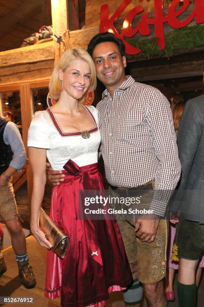 Natascha Gruen and her boyfriend Param Multani during the Oktoberfest at Theresienwiese on September 23, 2017 in Munich, Germany.